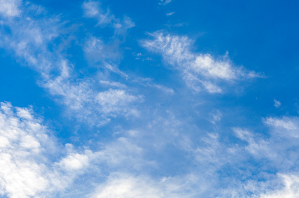 blue sky with wispy clouds